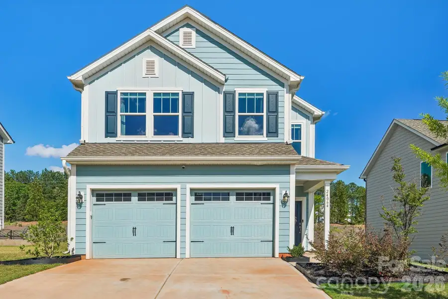 Front exterior of a new home in Edgewater Lakeview On Your Lot, Lancaster, SC, highlighting curb appeal (Image 1). Front exterior of a new home in Edgewater Lakeview On Your Lot, Lancaster, SC, highlighting curb appeal (Image 1).