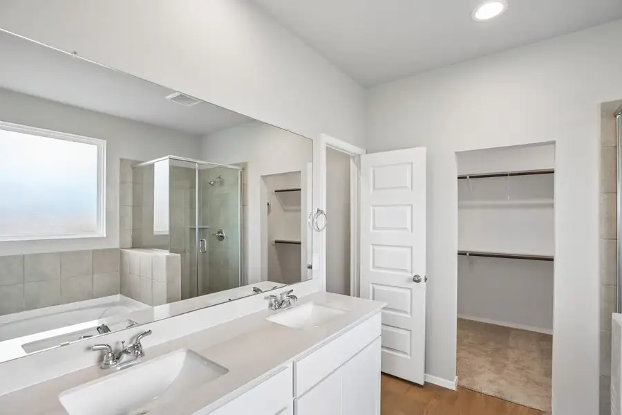 Furnished interior view inside a new home in Sorella, Tomball (Image 8).