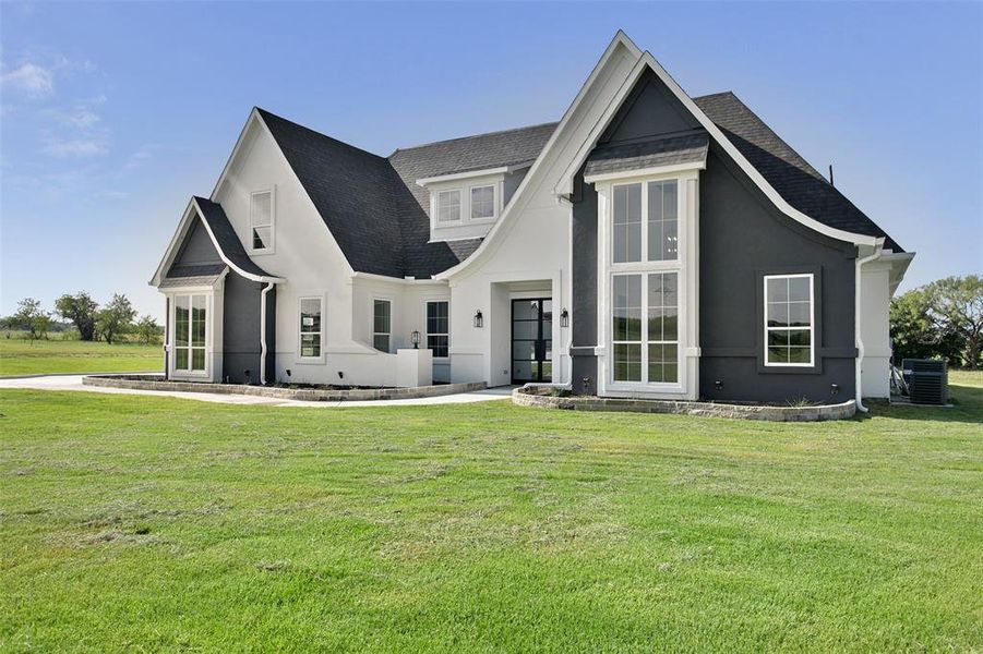 Front exterior of a new home in , Joshua, TX, highlighting curb appeal (Image 1).