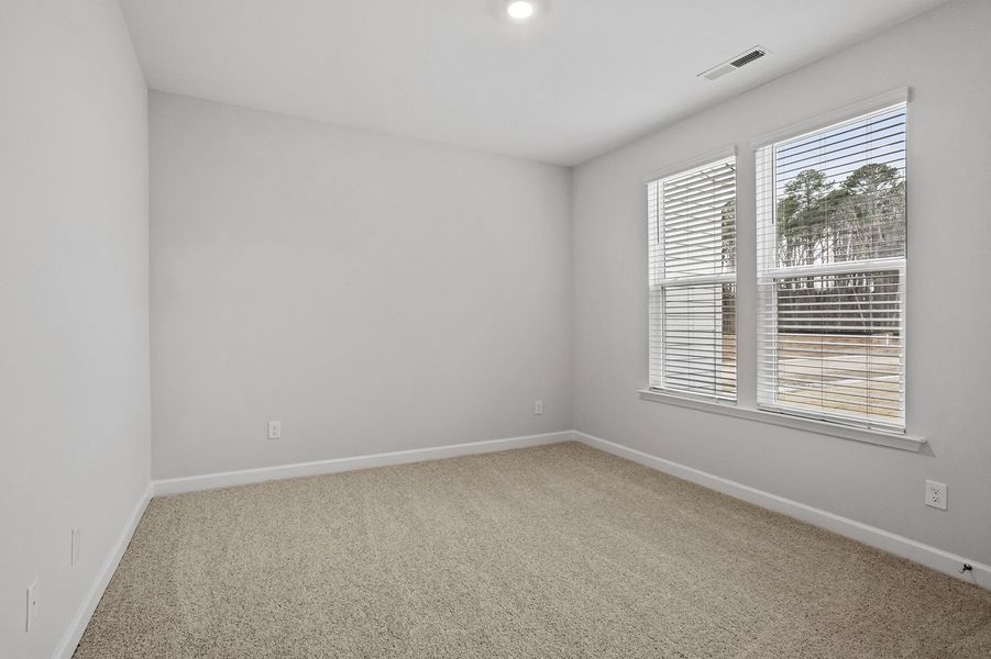 Spacious, unfurnished interior of a new home in Ovation at Sweetbrier, Durham (Image 23).