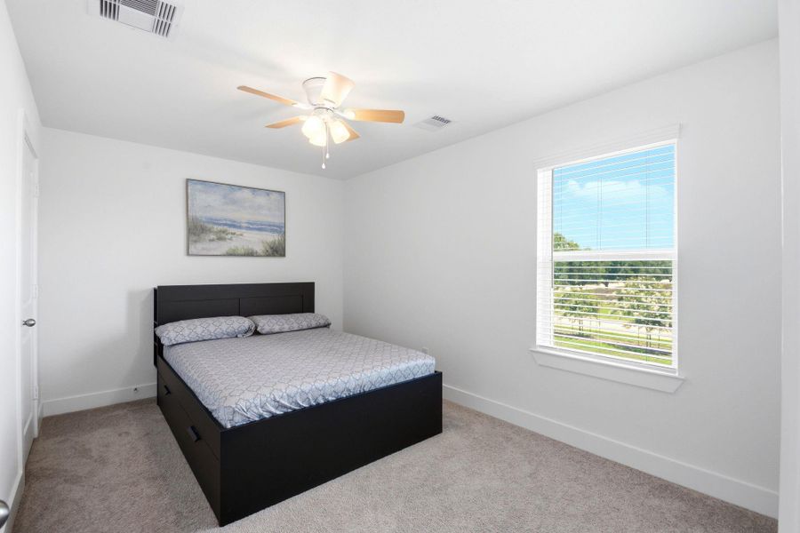 Furnished interior view inside a new home in Massey Oaks, Pearland (Image 37).