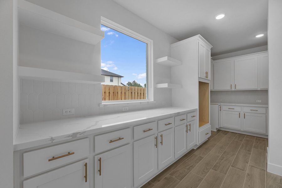 Furnished interior view inside a new home in COLTON®, Todd Mission (Image 9).