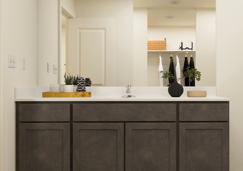 Rendering of a master bathroom showing a large single-sink vanity with grey cabinetry. Rendering of a master bathroom showing a large single-sink vanity with grey cabinetry.