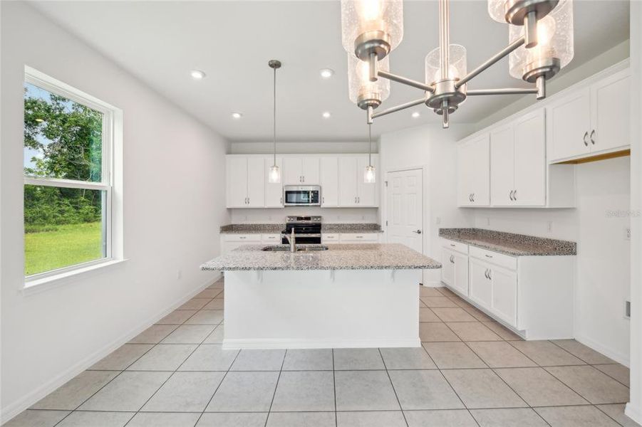 Furnished interior view inside a new home in Green Leaf, Melbourne (Image 3).