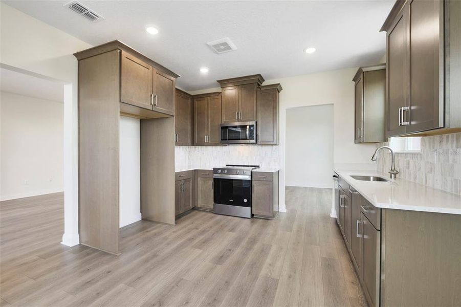 Furnished interior view inside a new home in Gatherings® of Lake Nona, Orlando (Image 11).