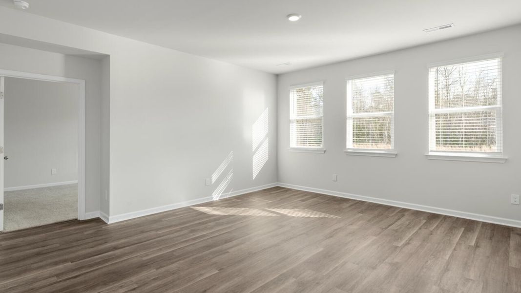 Spacious, unfurnished interior of a new home in Indigo Preserve, Leland (Image 18).