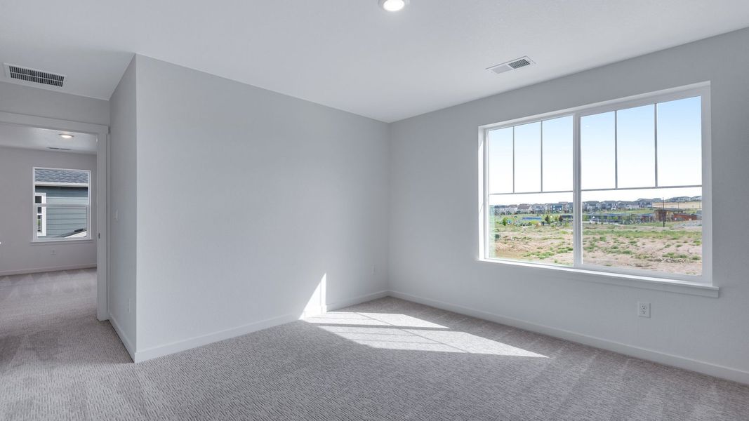 Spacious, unfurnished interior of a new home in Trails at Crowfoot, Parker (Image 20).