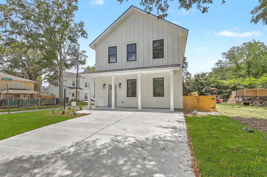 Front exterior of a new home in , Charleston, SC, highlighting curb appeal (Image 2).