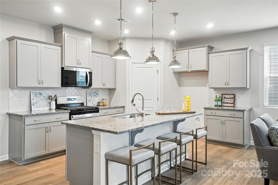 Representational only. Actual exterior elevation and interior finishes can vary.