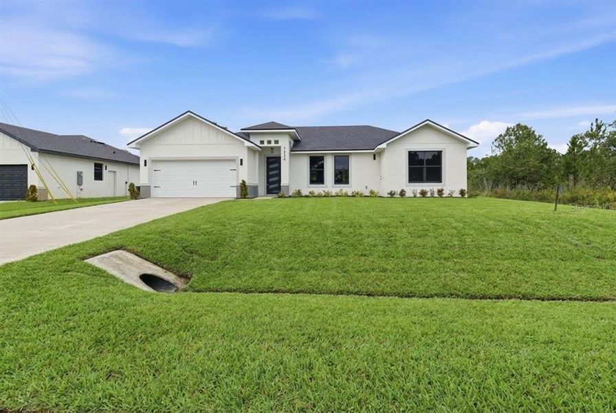 Front exterior of a new home in , Sebring, FL, highlighting curb appeal (Image 2). Front exterior of a new home in , Sebring, FL, highlighting curb appeal (Image 2).