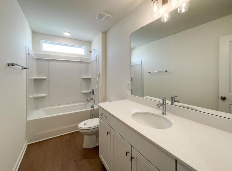 Furnished interior view inside a new home in Bellevue Townhomes, Greenville (Image 9).