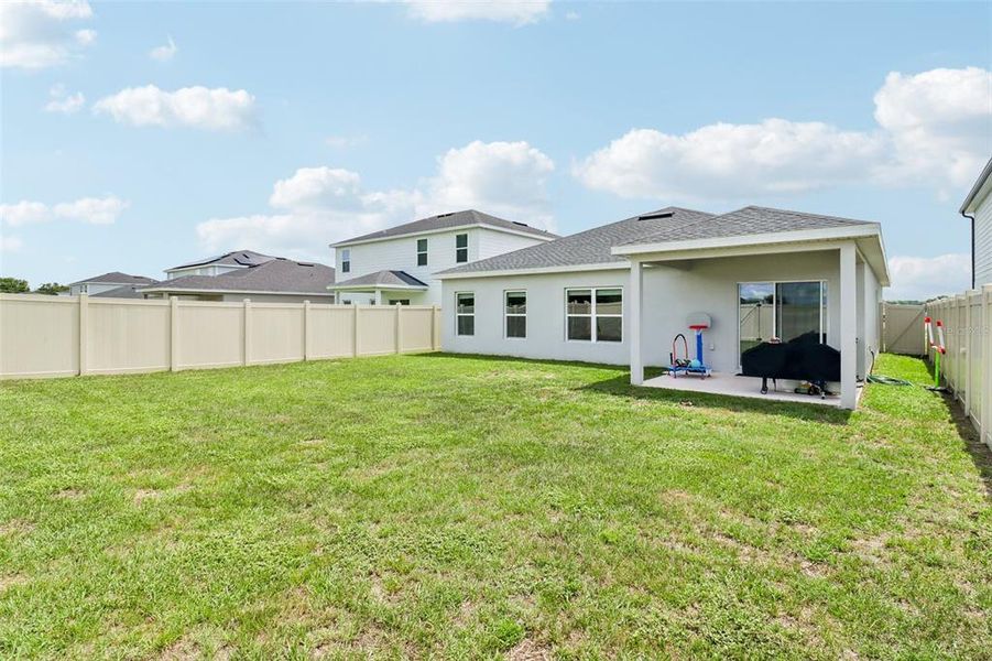 Exterior details and patio area of a home in , Sumterville (Image 29).