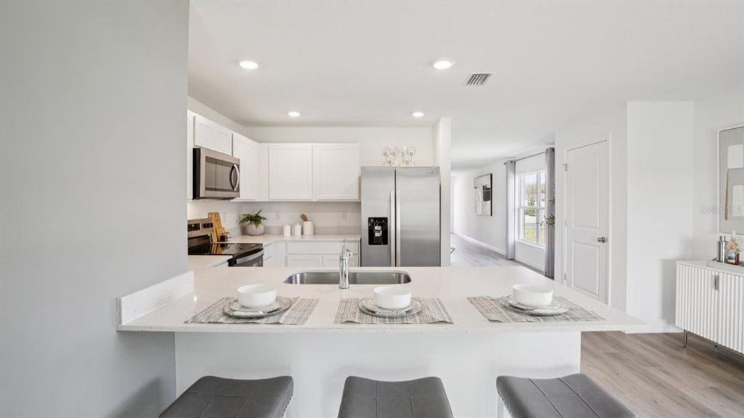 Furnished interior view inside a new home in Archer at Two Rivers, Zephyrhills (Image 13).