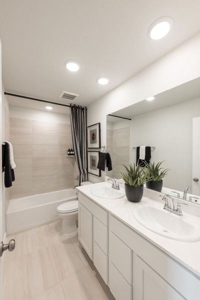 Furnished interior view inside a new home in Mason Woods, Cypress (Image 28).