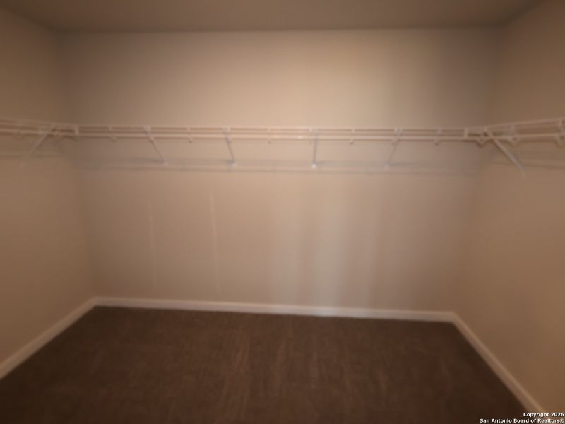 Spacious, unfurnished interior of a new home in Winding Brook, San Antonio (Image 22).