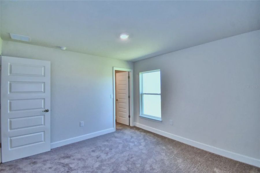 Spacious, unfurnished interior of a new home in Cadence Crossing, Auburndale (Image 22).