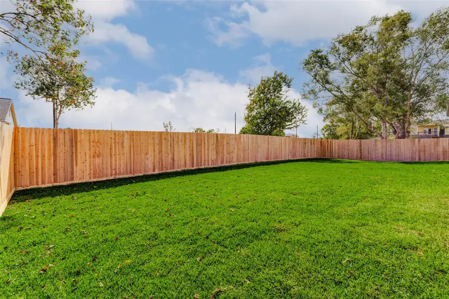 Amazing yard space with brand new fencing. Notice the fence panels have the prettier side pointing to the homeowner.