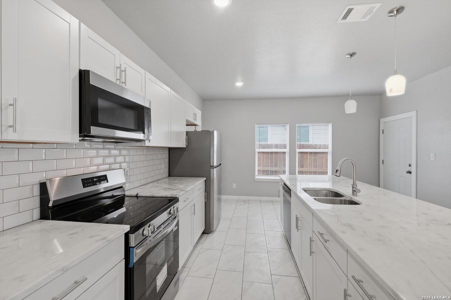Furnished interior view inside a new home in , San Antonio (Image 10).