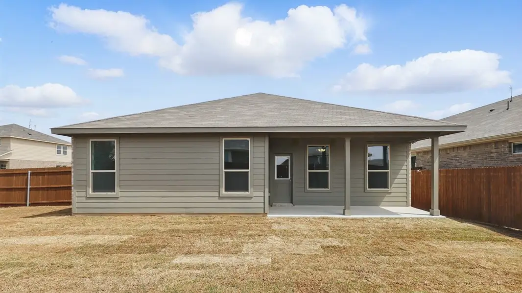 Exterior details and patio area of a home in Springhill South, Boyd (Image 3).