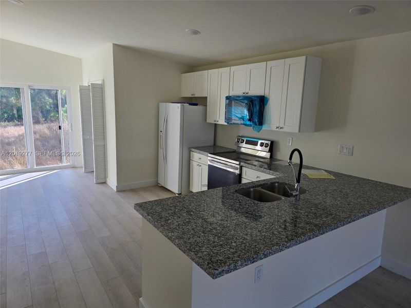 Furnished interior view inside a new home in , Lehigh Acres (Image 6).