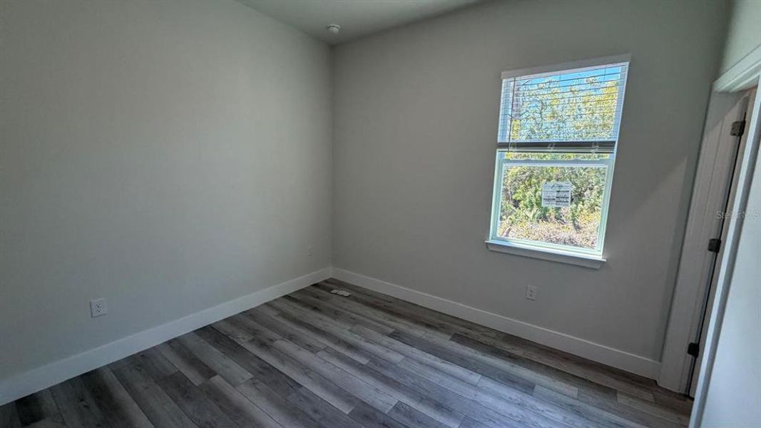 Spacious, unfurnished interior of a new home in , Port Charlotte (Image 26).