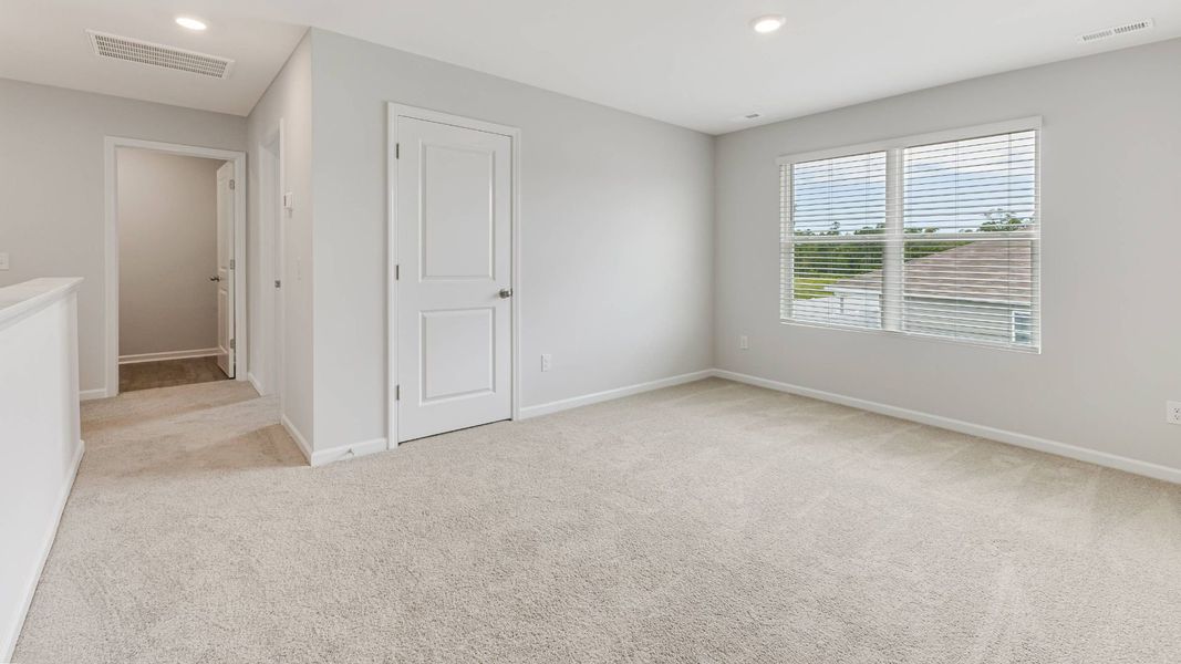 Representative unfurnished interior of a home built from the HAYDEN by D.R. Horton in Saltgrass Landing, Winnabow (Image 25).