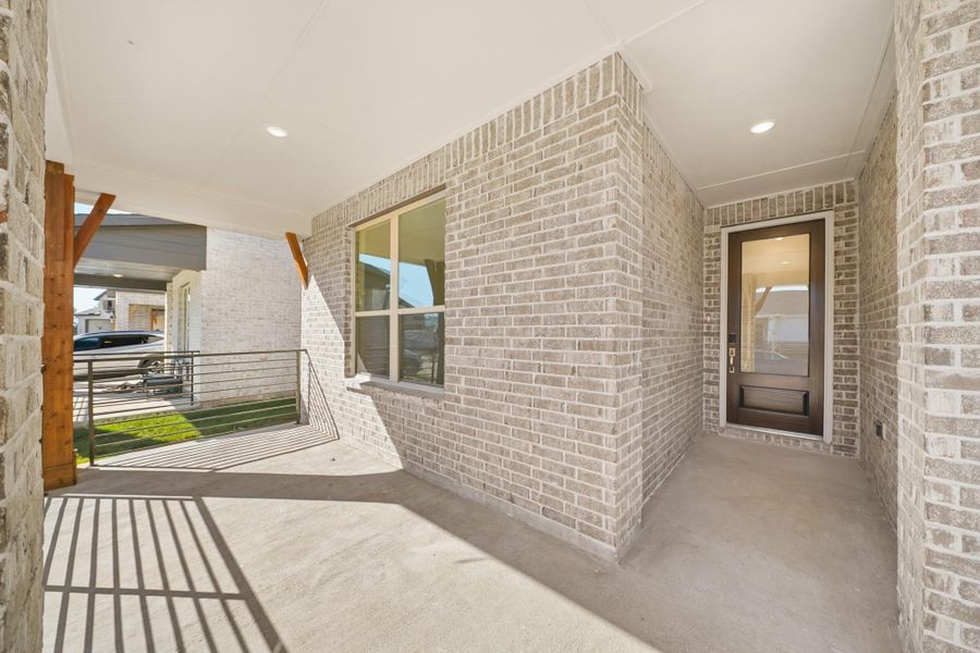 A spacious covered patio designed to gather and enjoy outdoor living in comfort and style. A spacious covered patio designed to gather and enjoy outdoor living in comfort and style.