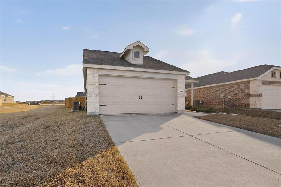 Front exterior of a new home in , Forney, TX, highlighting curb appeal (Image 22).