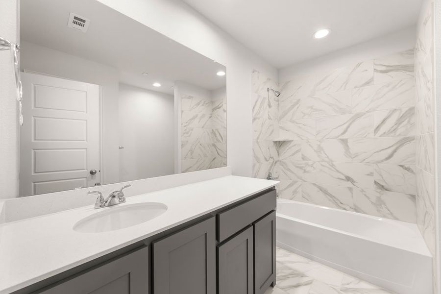 Representative exterior photo of a completed home built from the Opal by Impression Homes in Sereno Oaks at Buckner Terrace, Dallas, TX (Image 22). Representative exterior photo of a completed home built from the Opal by Impression Homes in Sereno Oaks at Buckner Terrace, Dallas, TX (Image 22).