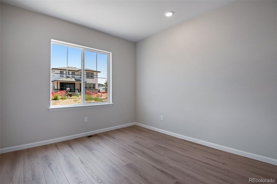 Spacious, unfurnished interior of a new home in Ensemble at The Aurora Highlands, Aurora (Image 30).