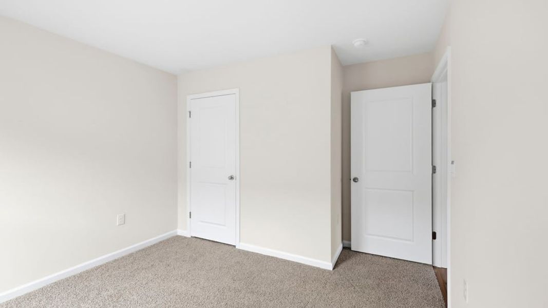 Spacious, unfurnished interior of a new home in Lakestone, Woodruff (Image 23).