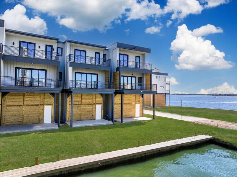 Front exterior of a new home in Lago Pointe, Seabrook, TX, highlighting curb appeal (Image 19).