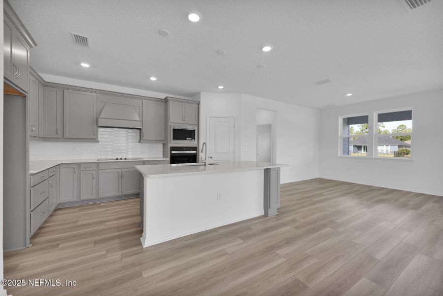 Furnished interior view inside a new home in Hyland Trail, Green Cove Springs (Image 9).