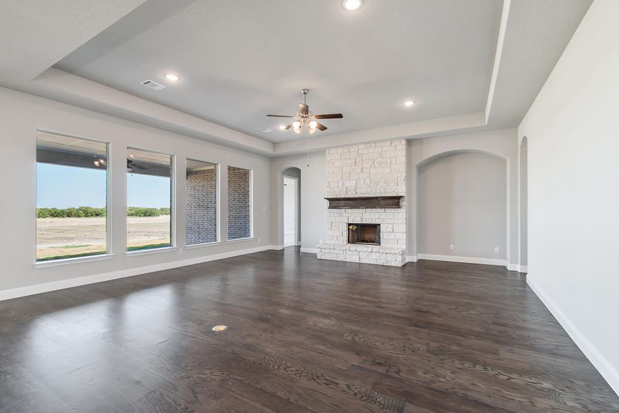 Family Room | Concept 3634 at Hidden Creek Estates in Van Alstyne, TX by Landsea Homes