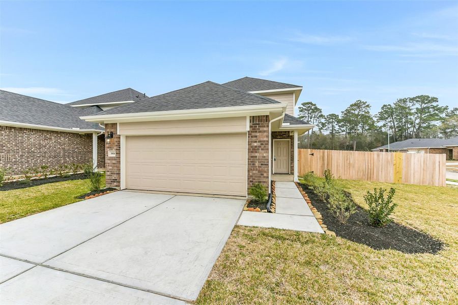 Front exterior of a new home in King Oaks Village, Baytown, TX, highlighting curb appeal (Image 22).