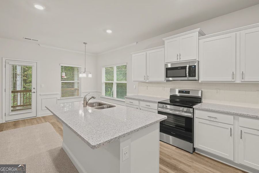 Furnished interior view inside a new home in Canterbury Villas, Carrollton (Image 6).