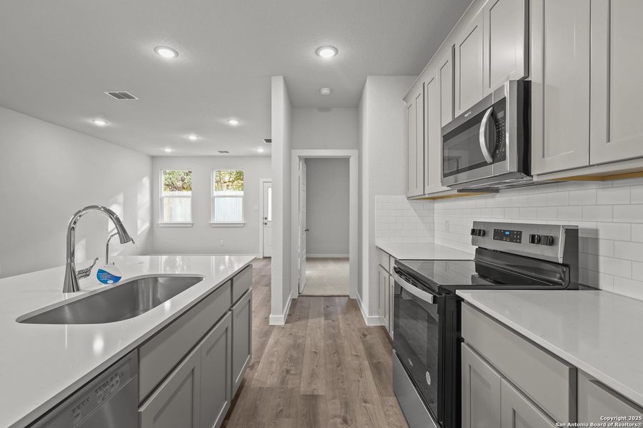 Furnished interior view inside a new home in Rosemont Hill, San Antonio (Image 7).