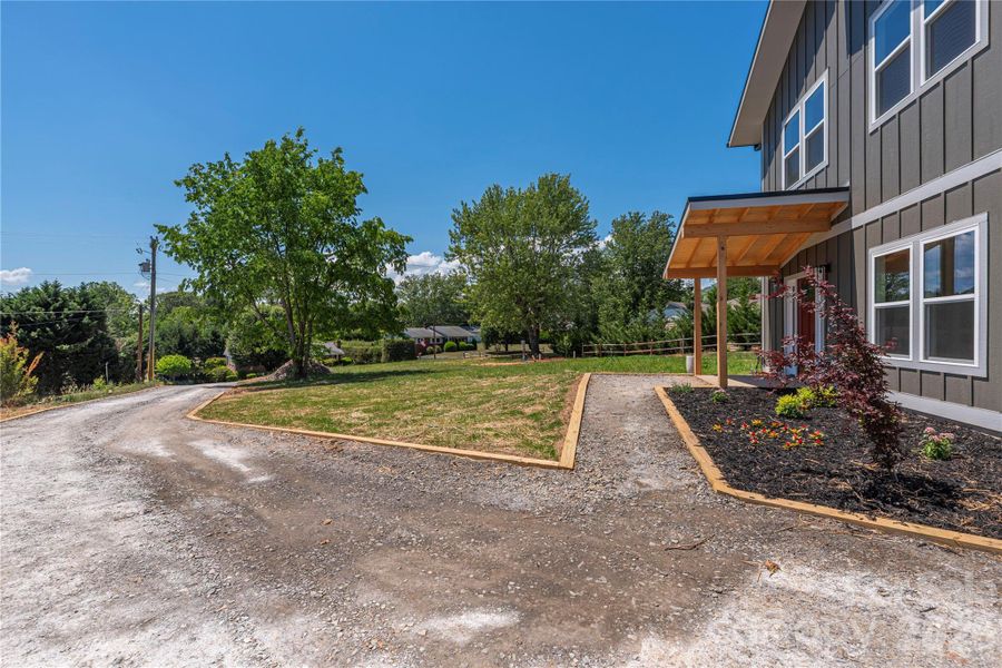 Exterior details and patio area of a home in , Candler (Image 18).
