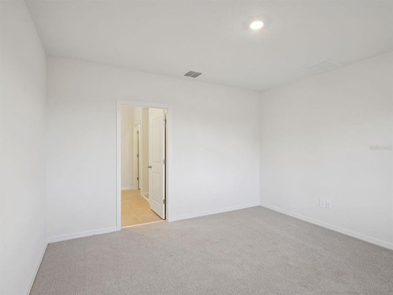 Spacious, unfurnished interior of a new home in Magnolia Bay - Premier Series, Nokomis (Image 9).