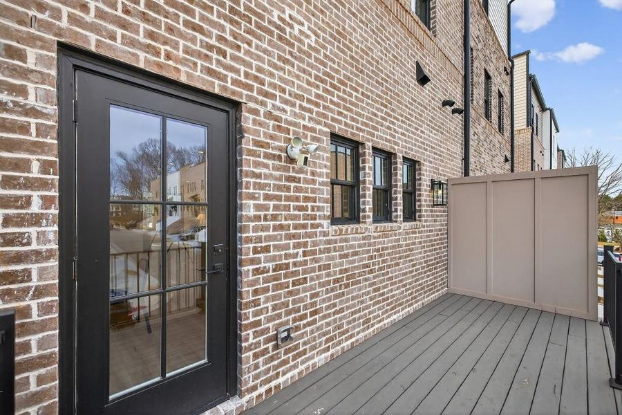 Exterior details and patio area of a home in Skyview On Broad, Sugar Hill (Image 26). Exterior details and patio area of a home in Skyview On Broad, Sugar Hill (Image 26).
