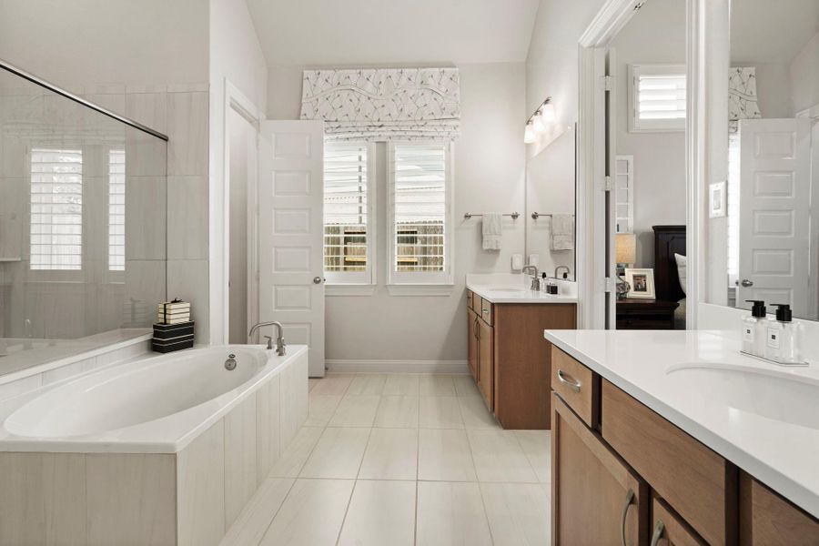 Oversized primary bathroom with dual vanities Oversized primary bathroom with dual vanities