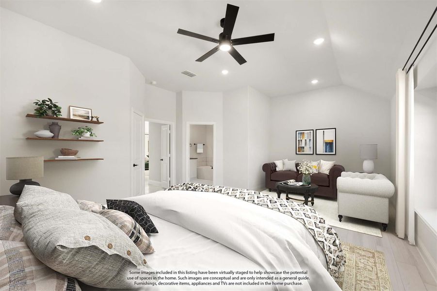 Spacious master bedroom with vaulted ceiling, ceiling fan, sitting area, and ensuite bathroom doorway Spacious master bedroom with vaulted ceiling, ceiling fan, sitting area, and ensuite bathroom doorway