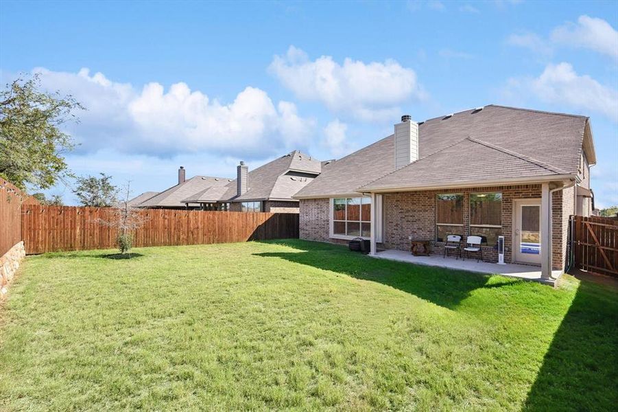 View of yard with a patio area