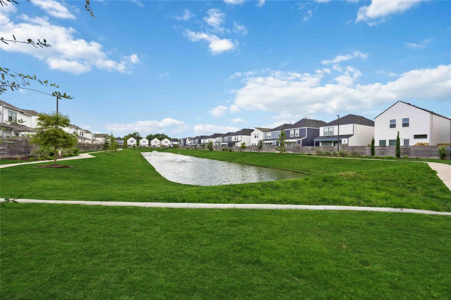 Amenities like guest parking, a scenic lake and walking trails enhance everyday living.