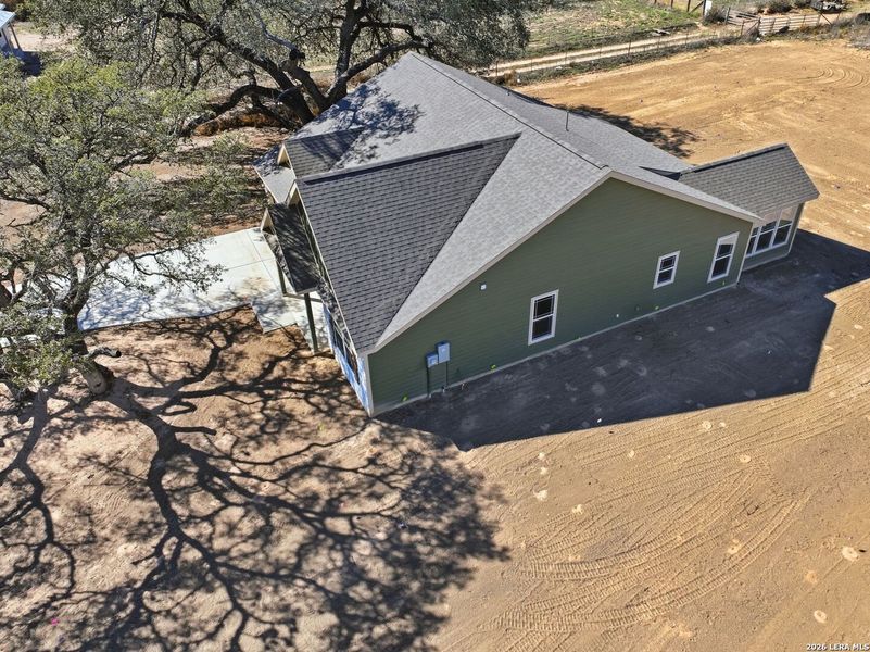 Exterior details and patio area of a home in Lonesome Dove, San Antonio (Image 29).