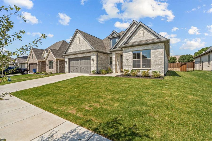 View of front of home with a front lawn