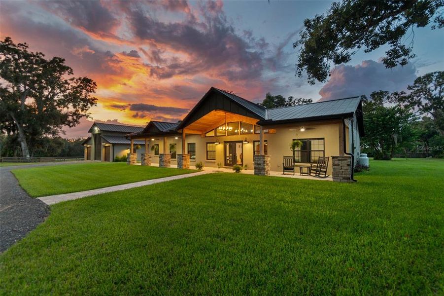 Front exterior of a new home in , Lithia, FL, highlighting curb appeal (Image 24).