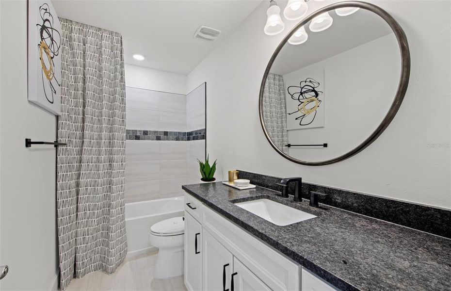 Furnished interior view inside a new home in Grandura, Sarasota (Image 22). Furnished interior view inside a new home in Grandura, Sarasota (Image 22).