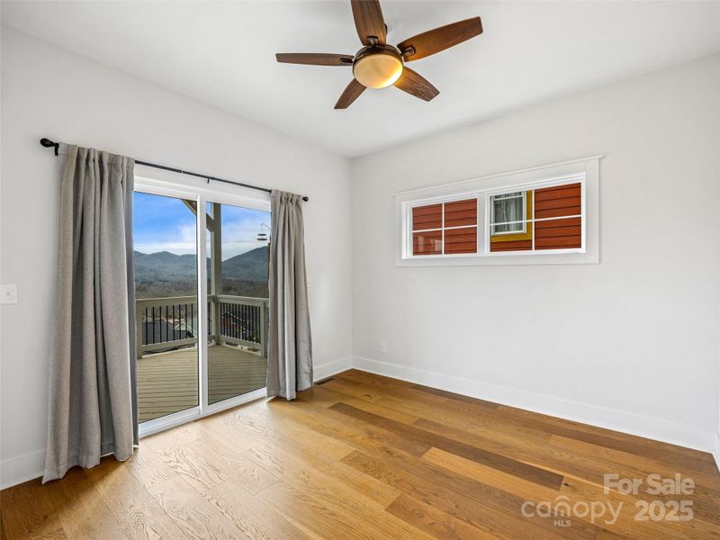 Lower Level primary with deck access Lower Level primary with deck access