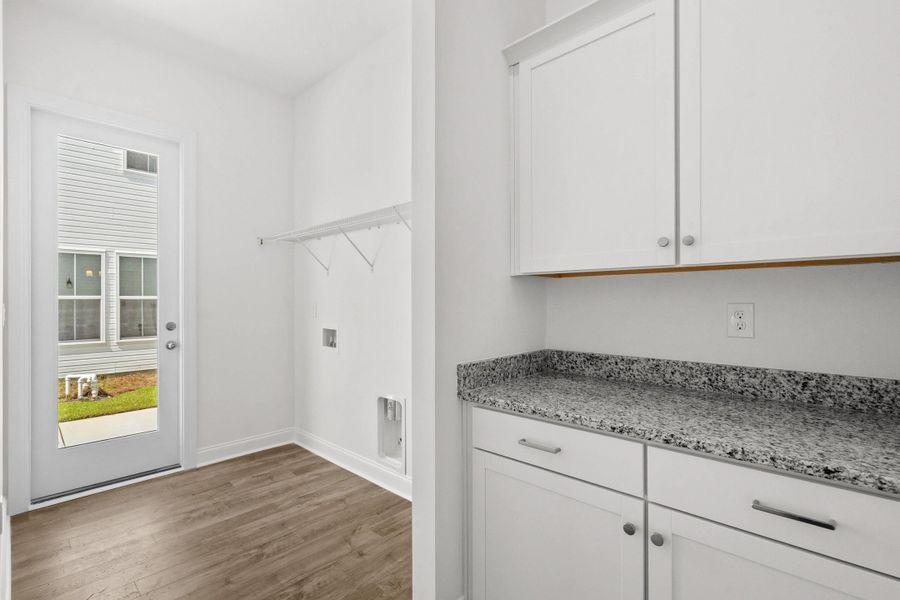 Furnished interior view inside a new home in Downtown Loris Homes, Loris (Image 16).
